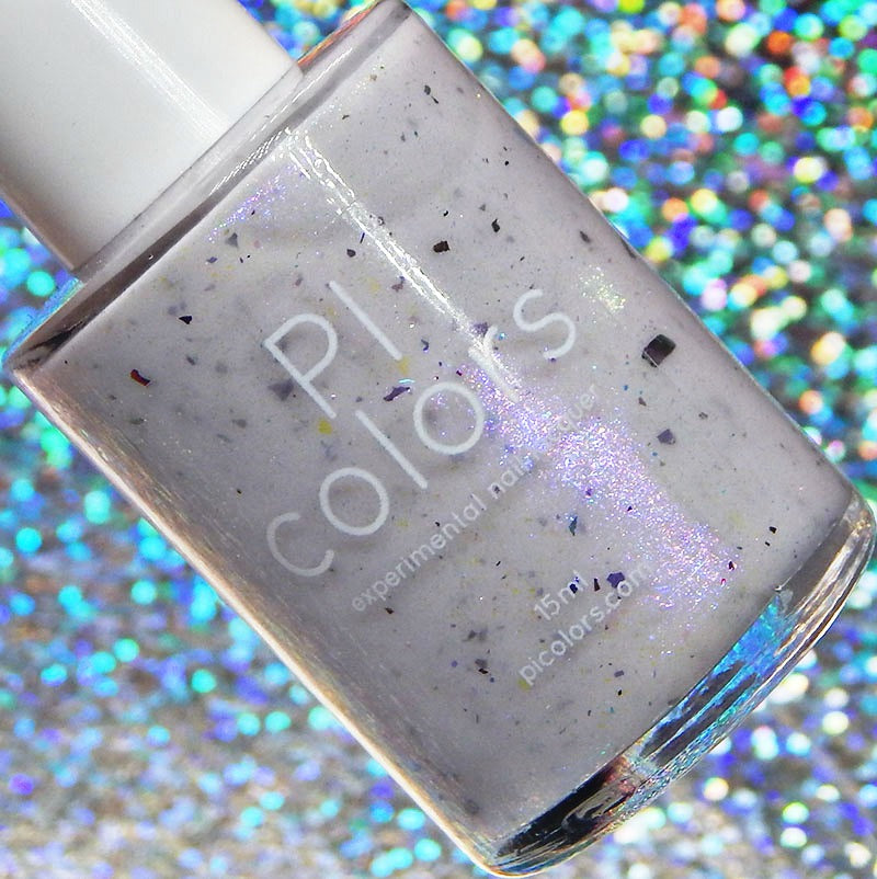 A bottle of PI Colors' Azarath.000 White Nail Polish, featuring a white and purple speckled shade, stands upright against a shimmering, multicolored holographic background adorned with chameleon flakes.