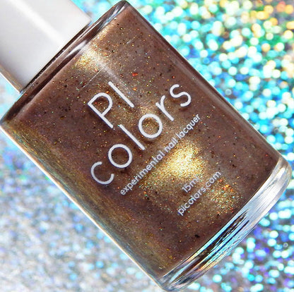 A bottle of PI Colors' Golden King.001 Gold Nail Polish, featuring a shimmering brown shade, is beautifully set against a backdrop of vibrant, colorful bokeh lights with a touch of holographic glitter magic.