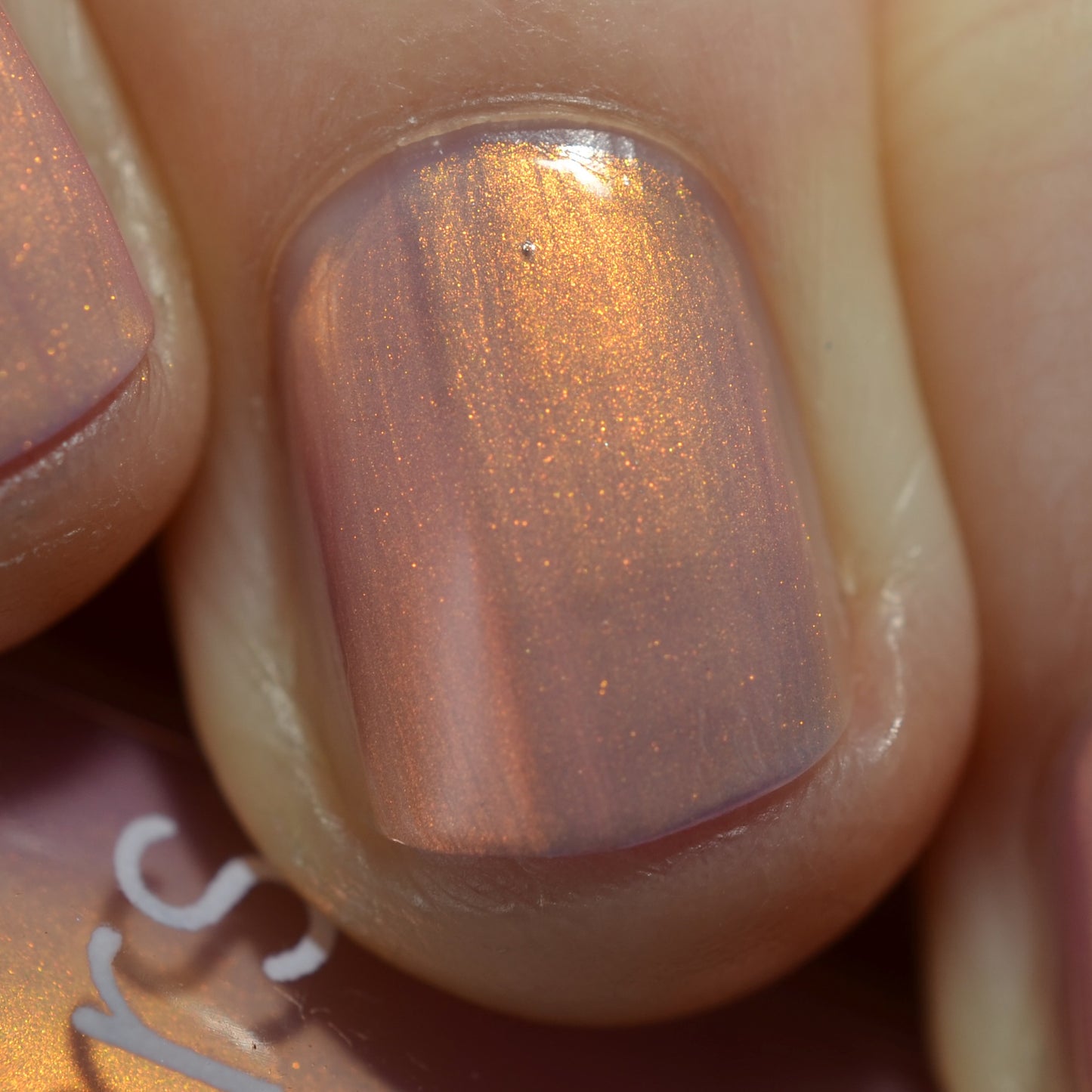 Hand with pink gradient nail polish