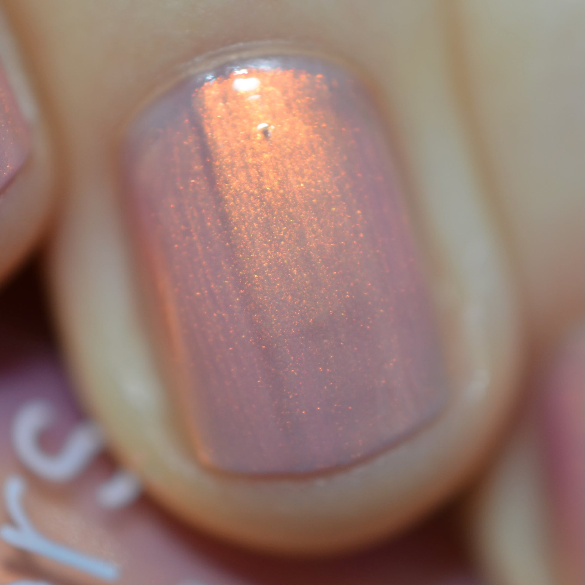 Hand with pink gradient nail polish