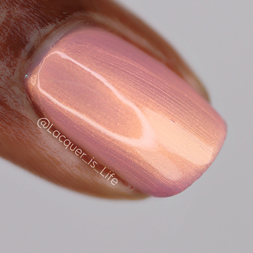 Close-up of a PI Colors pink nail polish swatch on a neutral background with 'Lacquer is Life' branding.