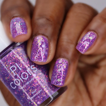 Purple nail polish with iridescent rainbow flakies and holo glitter by PI Colors