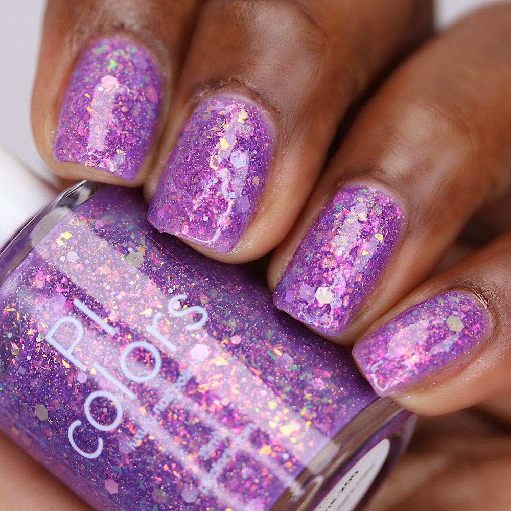 Purple nail polish with iridescent rainbow flakies and holo glitter by PI Colors