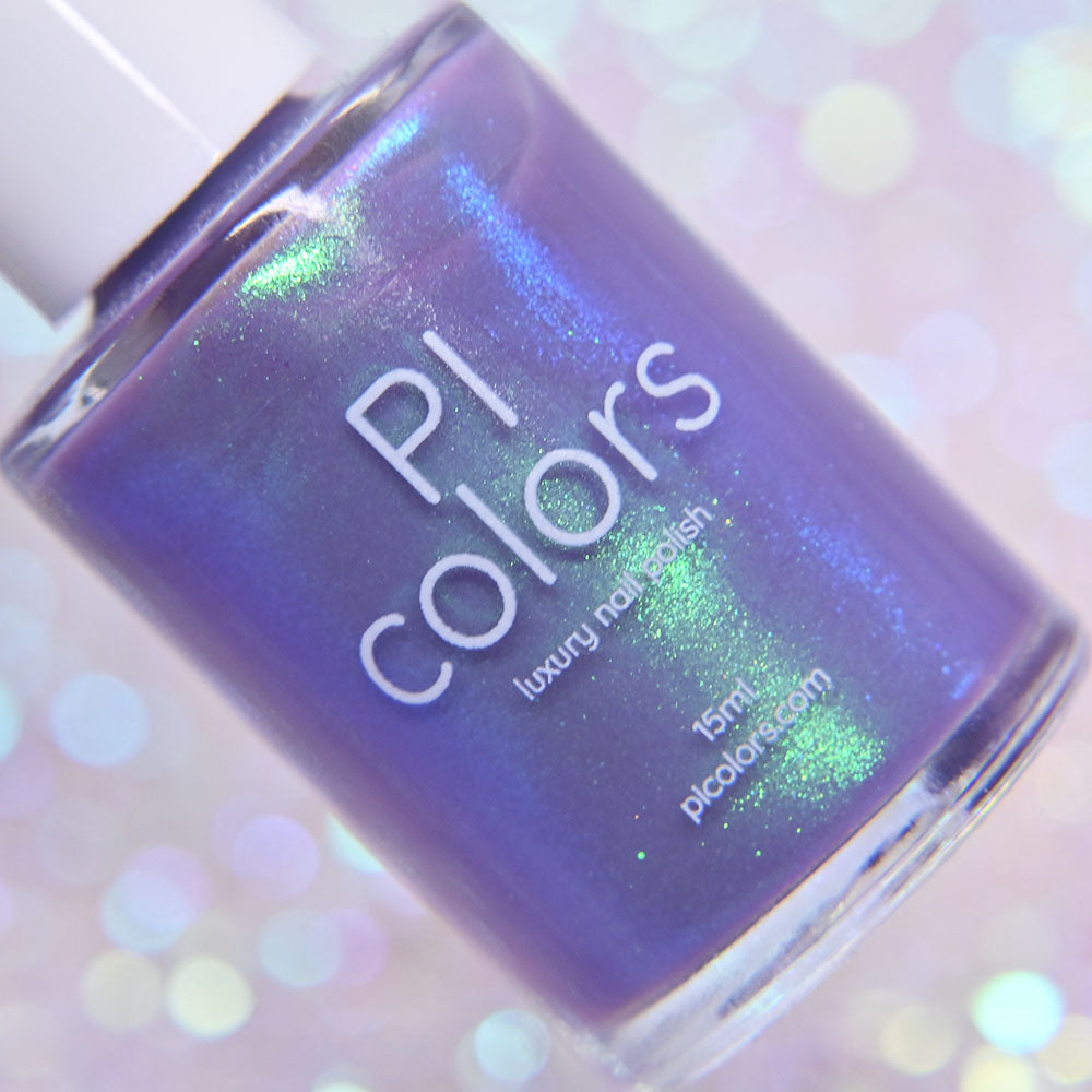 Purple nail polish bottle with 'PI colors' branding on a glittery background