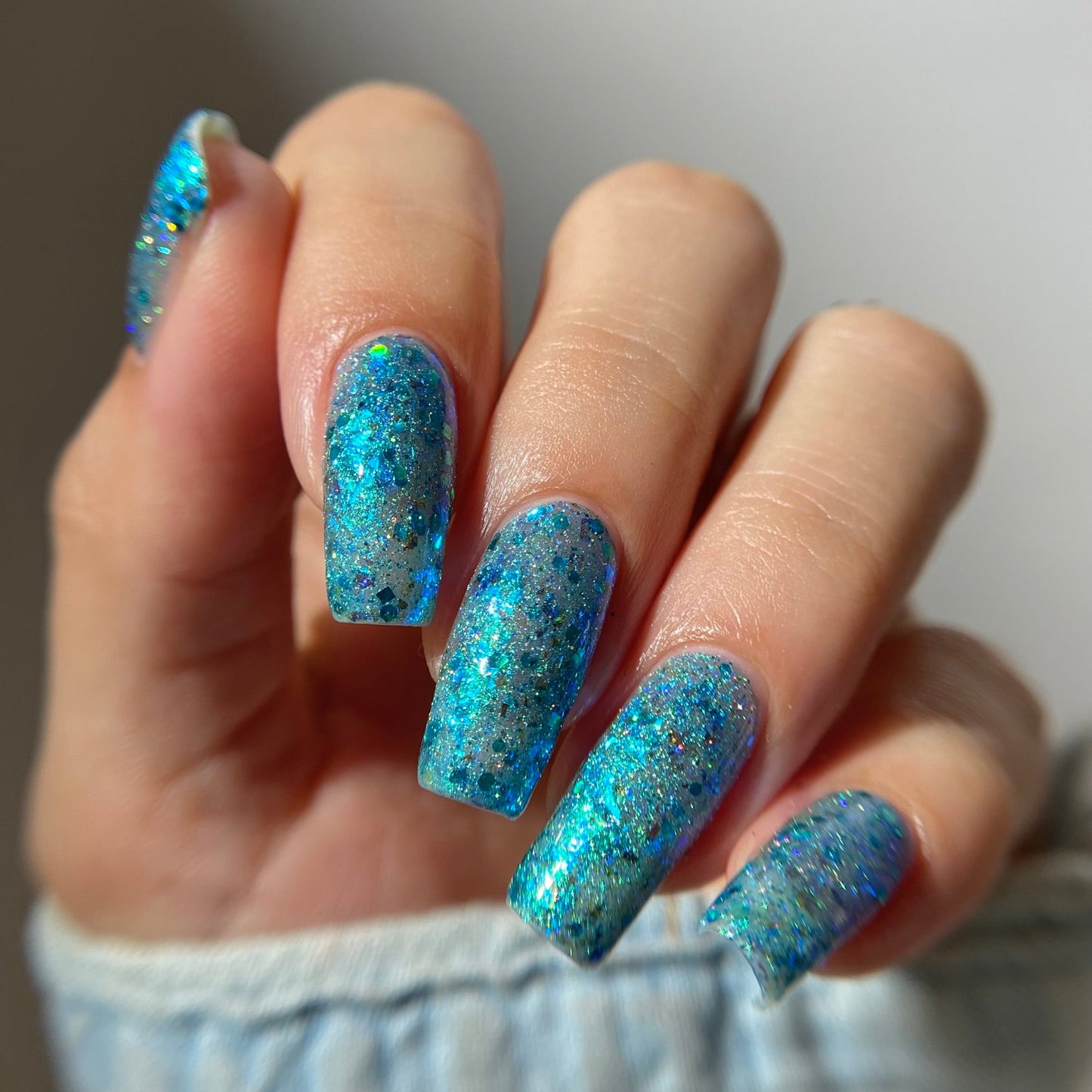 Turquoise holo glitter nail polish by PI Colors