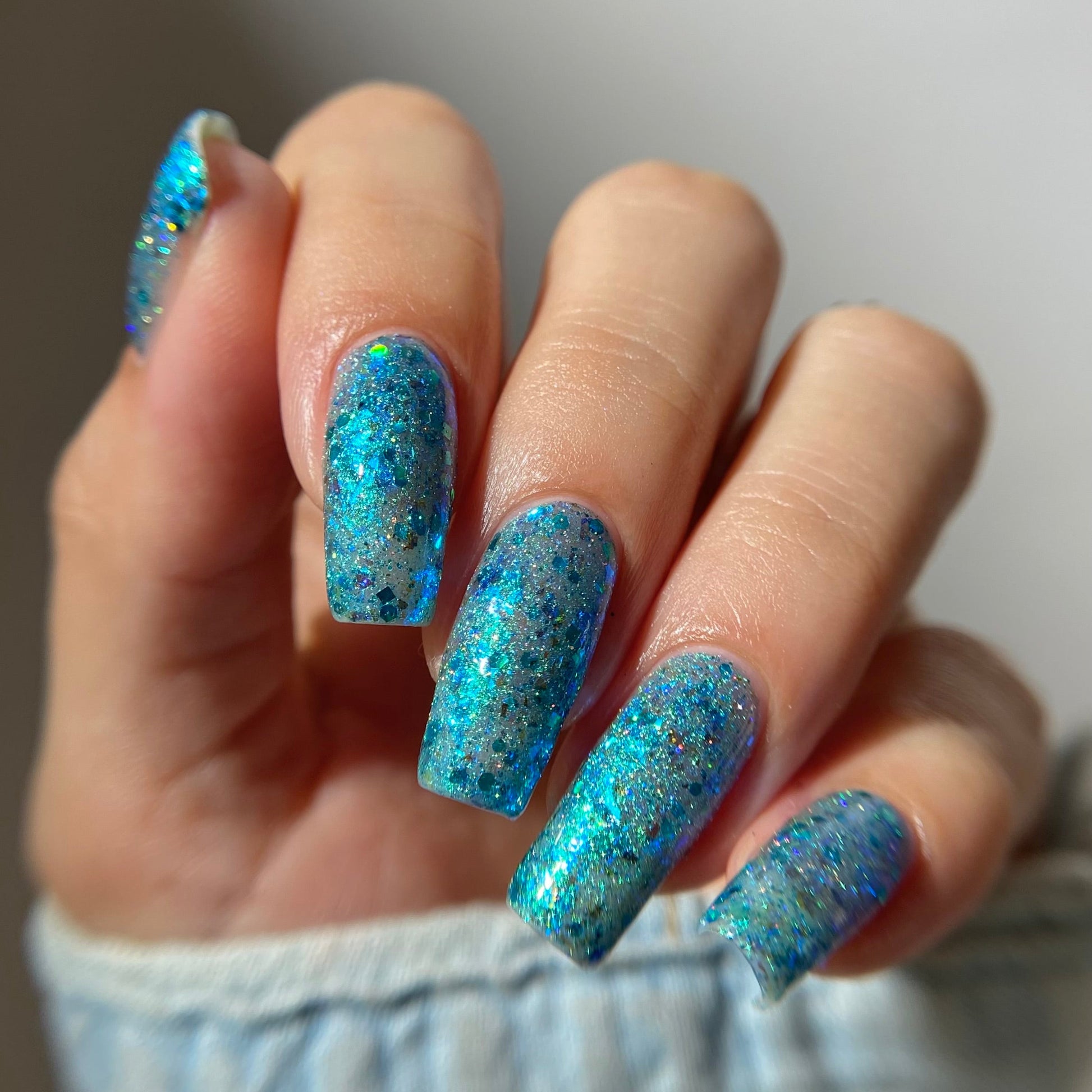 Turquoise holo glitter nail polish by PI Colors