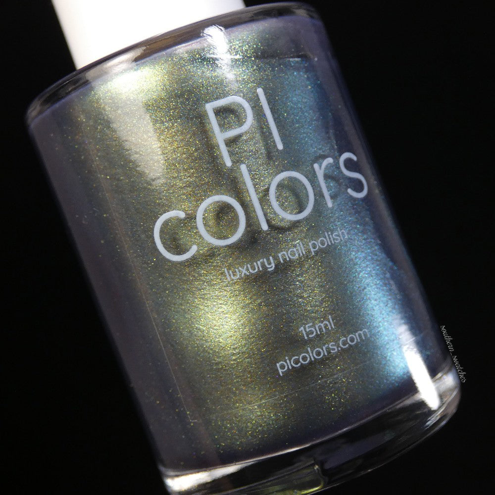 A close-up of a PI Colors Light/Forest.000 Green Nail Polish bottle reveals shimmering blue and green hues. The label reads "handmade luxury nail polish" and "15ml, picolors.com" against a sleek black background.