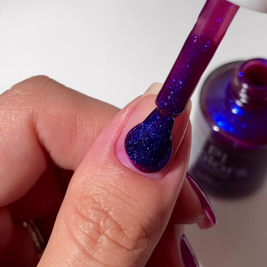 video of purple nail polish applied to natural nail