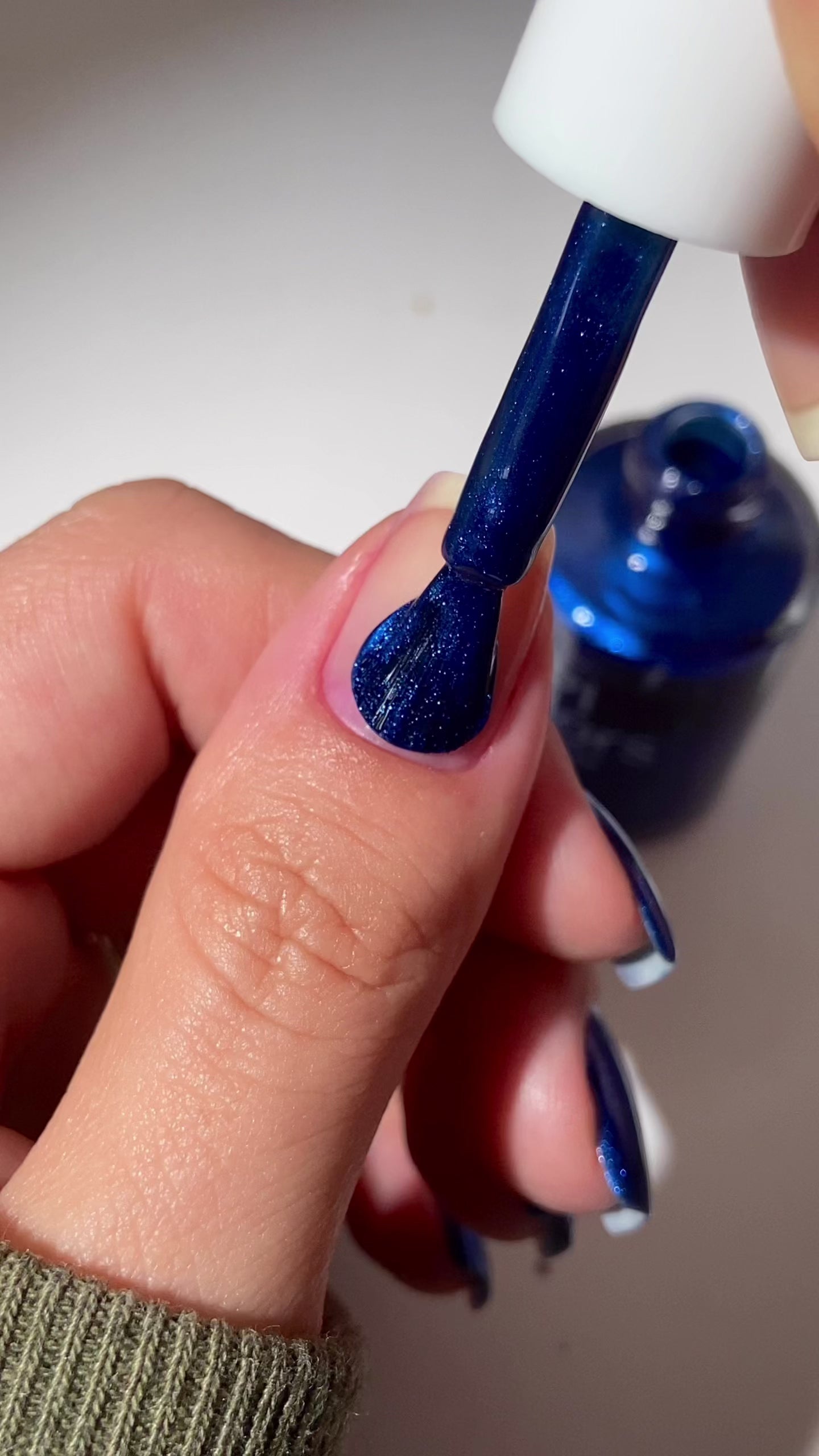 video of Blue nail polish applied to natural nail