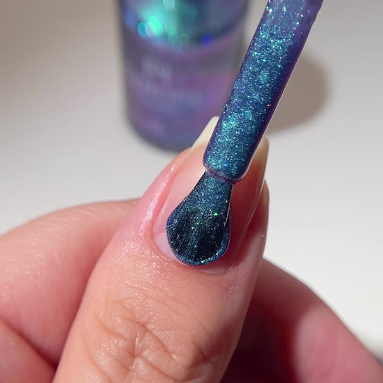 PI Colors glittery blue green nail polish